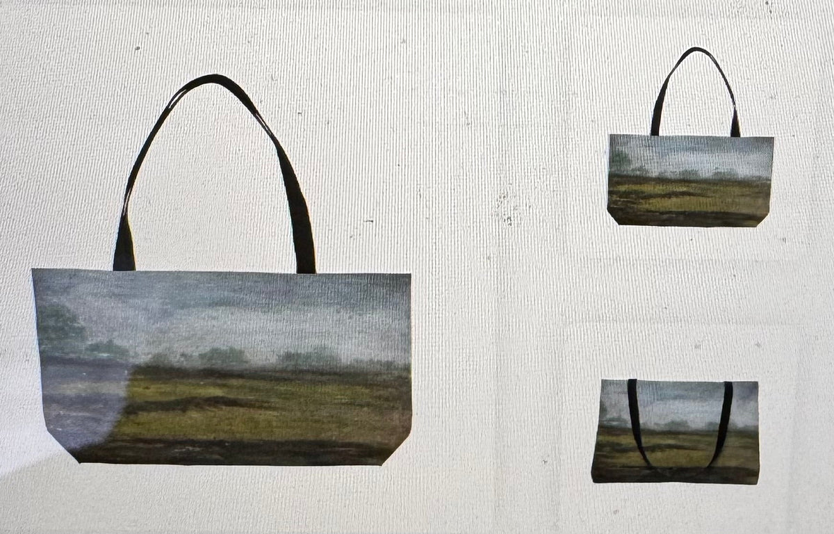 A tote bag with a landscape print is shown on a white textured background, alongside smaller views of the same design and a dashed template square.