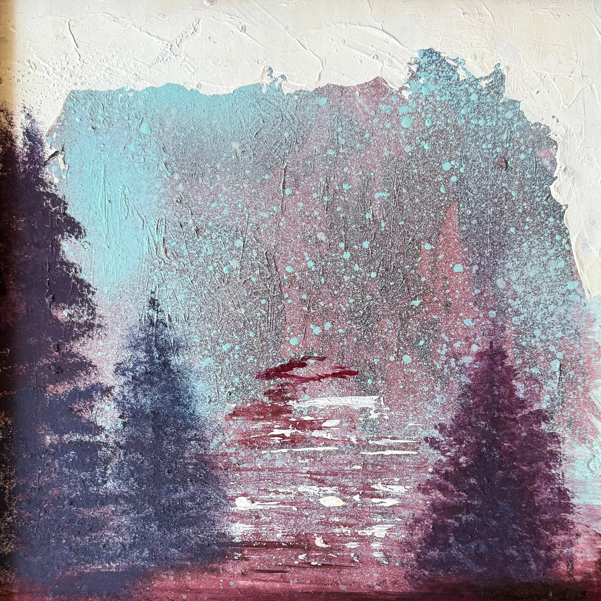 A framed landscape painting featuring dark pine tree silhouettes against a textured background of teal, pink, and purple brushstrokes, set in a rustic brown wooden frame.